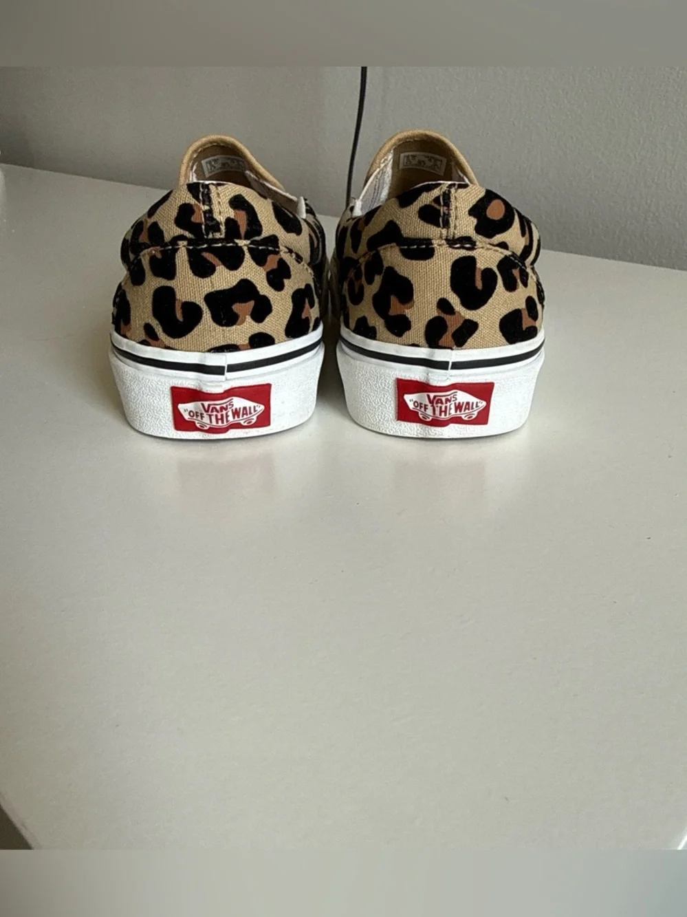 Vans Kids Leopard Print Slip-On Sneakers in Tan and Black
